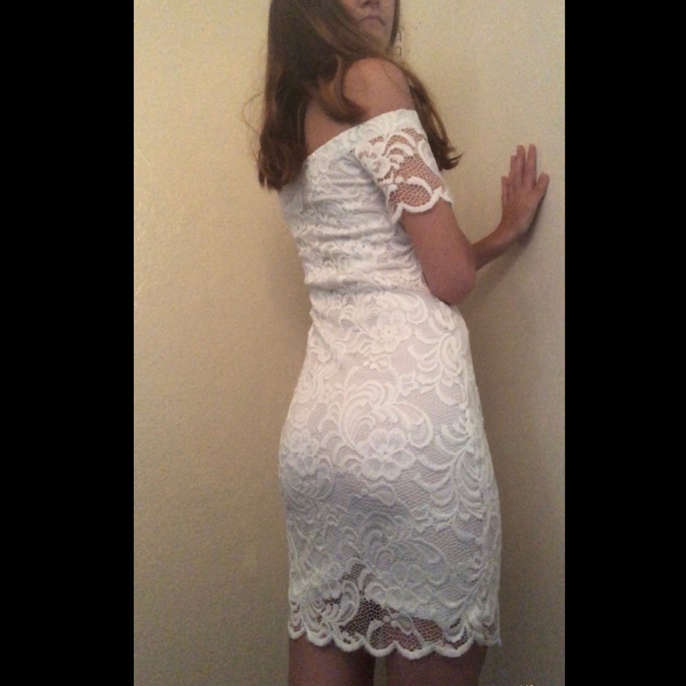 white off shoulder dress with lace overlay